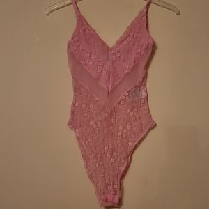 Pink lace and sheer bodysuit